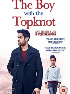 Мальчик с пучком на голове